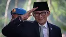 Menteri Pariwisata Sandiaga Uno tiba untuk menghadiri Sidang Tahunan MPR, Sidang Bersama DPR dan DPD tahun 2024 di kompleks Parlemen, Senayan, Jakarta, Jumat (16/8/2024). (Yasuyoshi CHIBA / AFP)