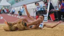 Maria Natalia Londa meraih tempat ketiga usai melakukan lompatan lompatan sejauh 6,27 meter. Tampak dalam foto, atlet Indonesia, Maria Natalia Londa, mendarat usai melakukan lompatan di final lompat jauh putri SEA Games 2025 di Suphachalasai National Stadium, Pathum Wan, Bangkok, Thailand, Selasa (16/12/2025). (Bola.com/Bagaskara Lazuardi)
