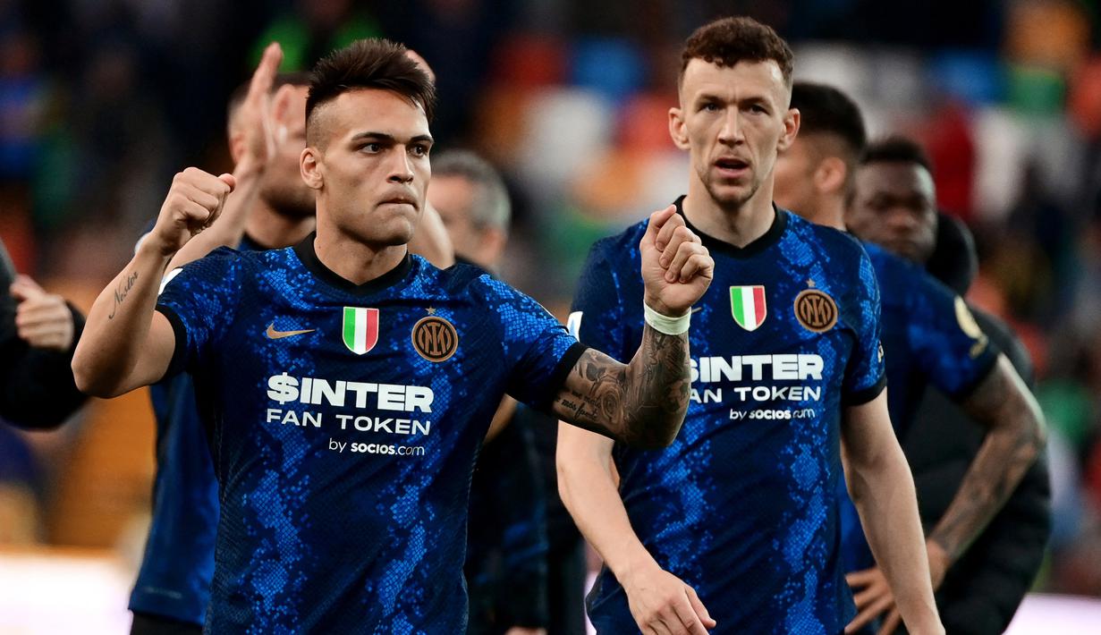 <p>Inter Milan harus kerja keras saat mengalahkan Udinese dengan skor 2-1. Dua gol pasukan Simone Inzaghi dicetak oleh Ivan Perisic dan Lautaro Martinez. (AFP/Miguel Medina)</p>