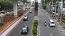 Sejumlah kendaraan melewati Jalan HR Rasuna Said, Jakarta, Sabtu (26/5). Sistem ganjil-genap yang diterapkan di sejumlah ruas jalan saat Asian Games 2018 mulai diuji coba pada awal Juli. (Liputan6.com/Immanuel Antonius)