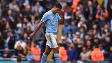 Gelandang Manchester City Rodri bereaksi meninggalkan lapangan setelah mendapat kartu merah dalam pertandingan Liga Inggris melawan&nbsp;Nottingham Forest di Etihad Stadium, Manchester, Sabtu, 23 September 2023. (Oli SCARFF / AFP)