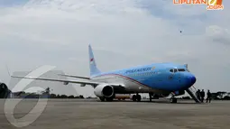 Pesawat Boeing Bussines Jet (BBJ)-2 itu berwarna biru putih bertulis 'REPUBLIK INDONESIA' yang dijajarkan dengan gambar garuda. Bagian ekor pesawat ada bendera Indonesia (Liputan6.com/Andrian M. Tunay)