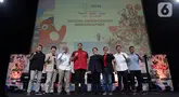 Peraih emas Olimpiade Sydney 2000 Candra Wijaya, Head of Sports Business EMTEK Group & CEO NEX Hendy Liem, Wakil Ketua Umum Komite Olimpiade Indonesia Ismail Ning, Menteri Pemuda dan Olahraga Ario Bimo Nandito Ariotedjo, Direktur SCM David Suwarto, Managing Director VIDIO Hermawan Sutanto, peraih emas Olimpiade Athena 2004 Taufik Hidayat, Atlet Menembak Fathur Gustafian (kiri ke kanan) saat Press Conference Official Broadcaster Announcement di Jakarta, Rabu (19/6/2024). (Liputan6.com/Helmi Fithriansyah)