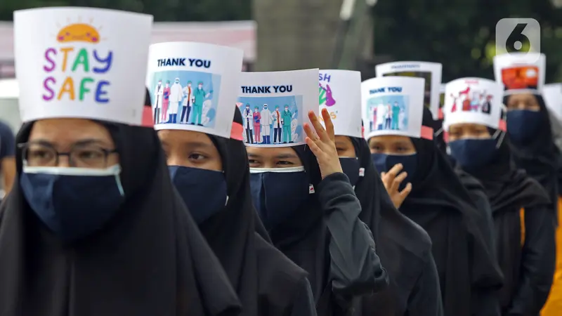 FOTO: Aksi Tepuk Tangan 56 Detik di Hari Kesehatan Nasional