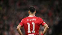Striker Liverpool, Mohamed Salah, saat menghadapi PSG pada leg 2 babak 16 besar Liga Champions 2024/2025 di Anfield, Rabu (12/3/2025) dini hari WIB. (Oli SCARFF / AFP)