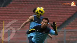 Penjaga gawang Timnas Indonesia I Made Wirawan sudah terlihat kembali berlatih usai izin selama 2 hari untuk keperluan keluarga (Liputan6.com/Helmi Fithriansyah)