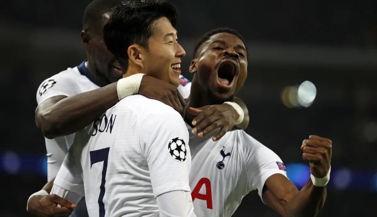 Perayaan gol Spurs dari kaki Heung Min Son pada leg 1, 16 besar Liga Champions yang berlangsung di stadion, Wembley, London, Kamis (14/2). Tottenham Hotspur menang 3-0 atas Borussia Dortmund (AFP/Glyn Kirk)