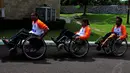 Sejumlah penyandang disabilitas menggunakan kursi roda saat menghadiri acara peringatan Hari Disabilitas Internasional di Gedung Konvensi TMP Kalibata, Jakarta, Rabu (10/12/2014). (Liputan6.com/Johan Tallo)