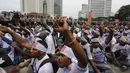 Massa dari Aliansi Mahasiswa Papua menggelar aksi unjuk rasa di Bundaran HI, Jakarta, Senin (1/12/2014). (Liputan6.com/Faizal Fanani) 