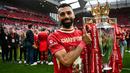 Pemain berkebangsaan Mesir tersebut juga sukses memberikan berbagai gelar bergengsi untuk Liverpool, mulai dari Liga Inggris dan Liga Champions. (AFP/Paul Ellis)