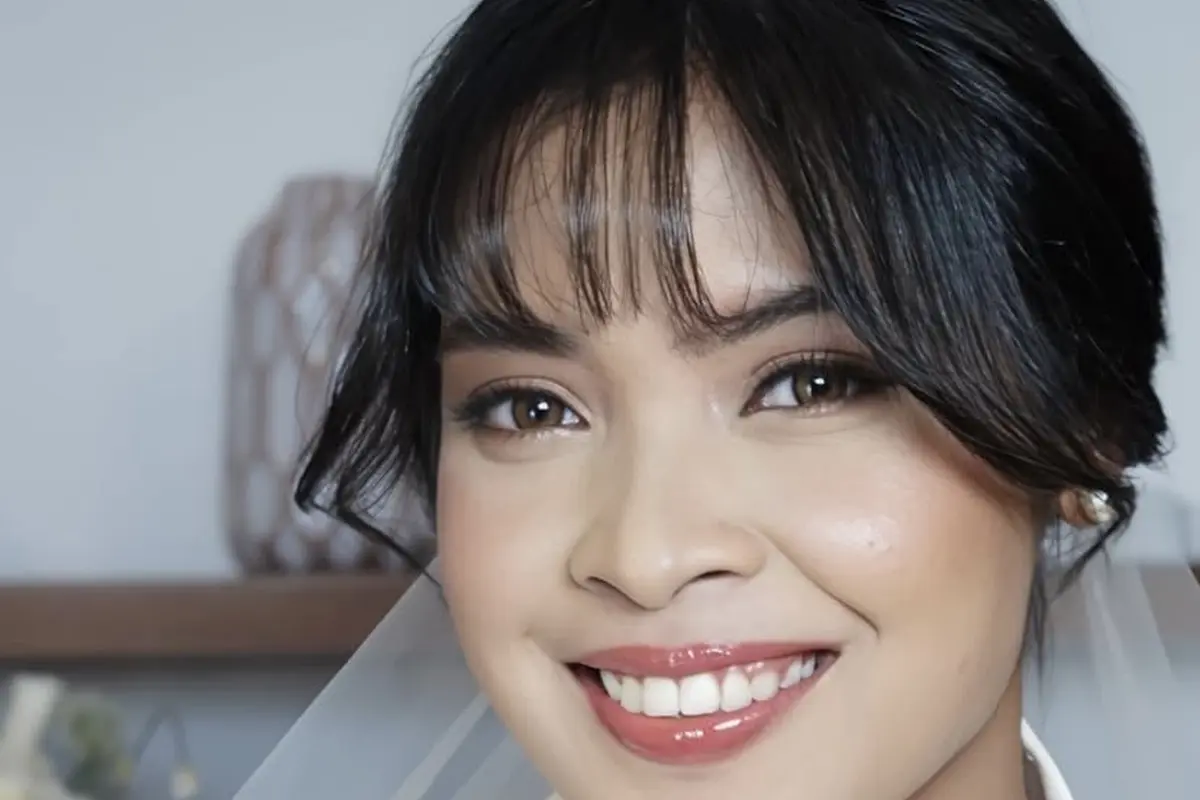 Pebulutangkis Gregoria Mariska menikah dengan Mikha Angelo