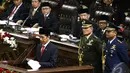 Presiden Terpilih Joko Widodo membacakan pidatonya saat pelantikan di Senayan, Jakarta, Senin (20/10/2014) (Liputan6.com/Andrian M Tunay)