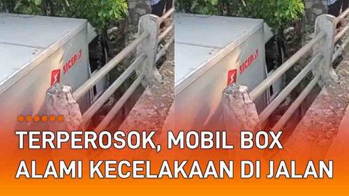 VIDEO: Terperosok, Mobil Box Pengirim Barang Alami Kecelakaan di Jalan