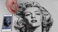 Unik, Pria Ini Pakai Rambut untuk Lukis Tokoh Dunia
