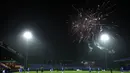 Kembang api menghiasi langit saat pertandingan antara  Stockport County melawan West Ham United pada laga Piala FA di Stadion Edgeley Park, Senin (11/1/2021). West Ham United menang dengan skor tipis 1-0. (Martin Rickett/Pool via AP)
