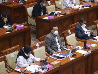 Suasana Rapat Dengar Pendapat (RDP) KPK dengan Komisi III DPR di Kompleks Parlemen Senayan, Jakarta, Rabu (10/3/2021). Dalam rapat dengar tersebut, KPK dan Dewan Pengawas (Dewas) KPK membahas terkait dengan evalusasi pelaksanaan tugas dan fungsi KPK. (Liputan6.com/Angga Yuniar)