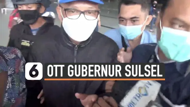 Gubernur Sulawesi Selatan Nurdin Abdullah digiring petugas KPK di bandara Soekarno Hatta Sabtu (27/2) pagi. Sebelumnya, ia kena OTT KPK bersama sejumlah orang lainnya di sebuah rumah makan.