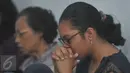 Sejumlah warga berdoa di Gereja Bethel Indonesia Kalijodo, Jakarta, Minggu (28/2/2016). Pemprov DKI Jakarta memberi kesempatan kepada warga Kristiani untuk beribadah sebelum penggusuran yang jatuh pada 29 Februari. (Liputan6.com/Gempur M Surya)
