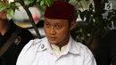 Salah satu tersangka pelaku persekusi diperlihatkan di Polda Metro Jaya, Jakarta, Jumat (2/6). Reskrim Polres Jaktim menangkap dua pelaku persekusi terhadap PMA, 15 tahun, karena diduga menghina FPI dan Rizieq Syihab. (Liputan6.com/Immanuel Antonius)