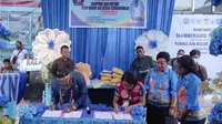 Penandatanganan kerja sama BPJS Kesehatan dan Pemkab Mamberamo Tengah untuk jaminan kesehatan warga setempat. (Liputan6.com/Katharina Janur/BPJS Kesehatan Jayapura)