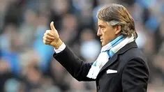 Roberto Mancini di partai debutnya sebagai manajer Manchester City dalam lanjutan Liga Premier versus Stoke City di City Of Manchester Stadium, Manchester, 26 Desember 2009. AFP PHOTO/Andrew Yates