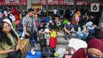 Calon penumpang yang hendak mudik menunggu keberangkatan dengan Bus AKAP di Terminal Kalideres, Jakarta Barat, Selasa (2/4/20024). (Liputan6.com/Angga Yuniar)