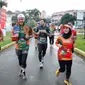 Gubernur Jawa Tengah Ganjar Pranowo dan sang istri, Siti Atikoh saat Bank Jateng Friendship Run Borobudur Marathon 2022 yang berlangsung di Medan, Sumatera Utara.