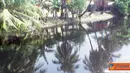 Citizen6, Jakarta: Kondisi sungai di Jakarta Utara di Jalan Gedong Panjang dekat Pasar Ikan sangat memprihatinkan. Air sungai berwarna hitam pekat, berbau serta banyak sampah yang menggenang. (Pengirim: Teguh Ardiyanto)