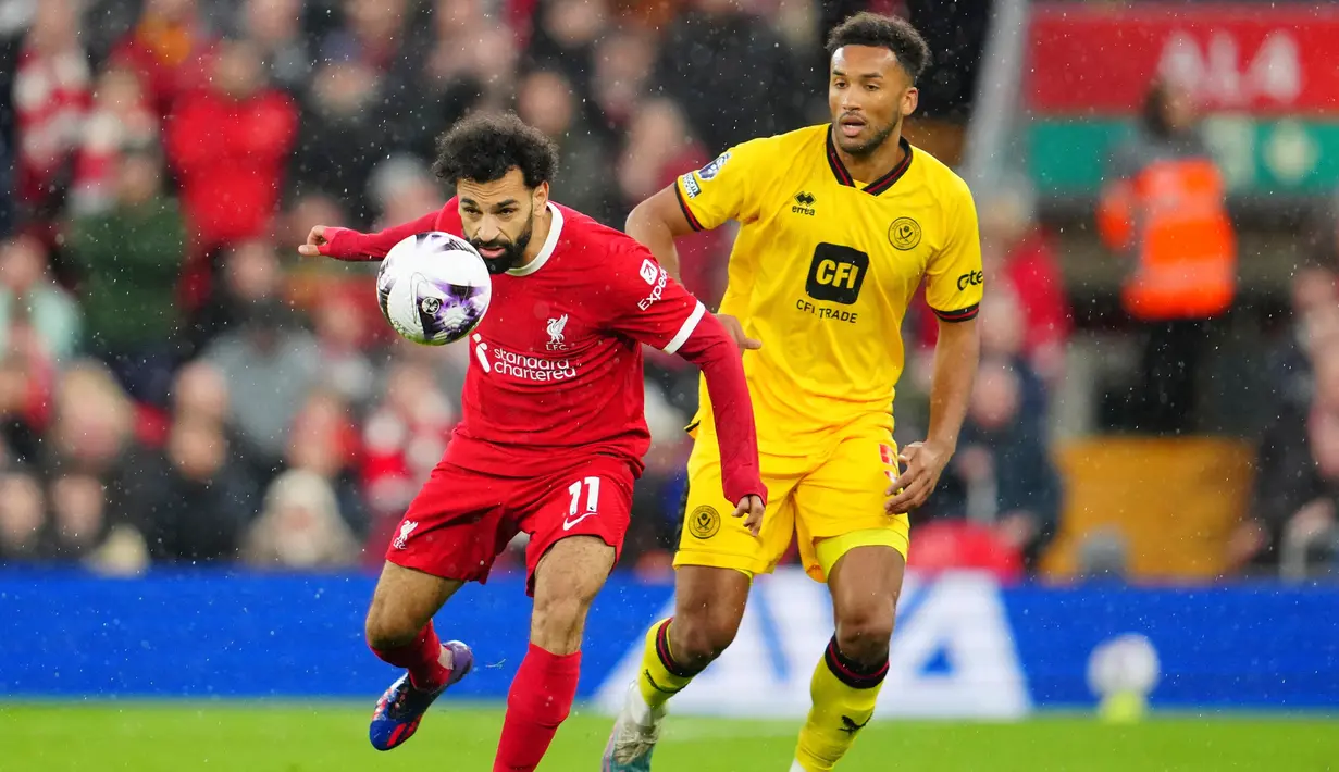 Bermain di Stadion Anfield, The Reds berhasil mengamankan tiga poin penting. (AP Photo/Jon Super)