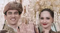 Enzy Storia dan Molen mengenakan pakaian adat Minang serba cokelat saat melangsung akan nikah. (@enzystoria)
