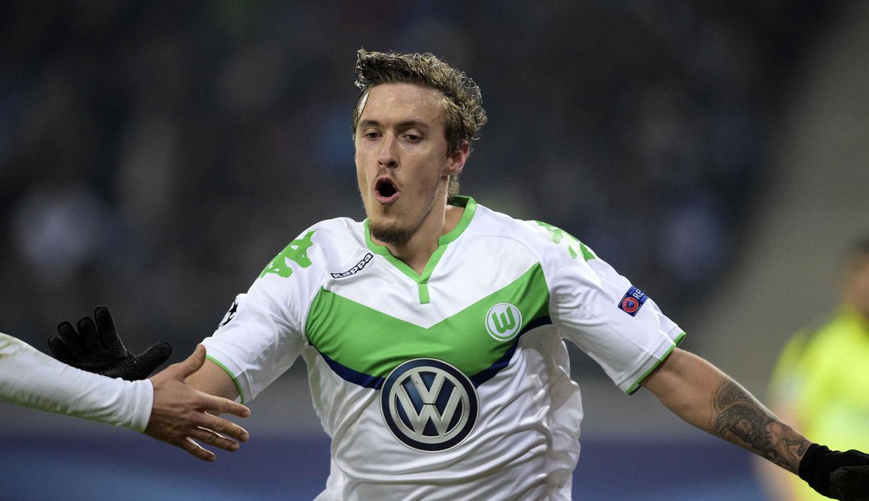 Pemain Wolfsburg, Max Kruse merayakan golnya ke gawang Gent pada leg pertama babak 16 besar Liga Champions di GHELAMCO-arena, Gent, Kamis (18/2/2016) dini hari WIB. (AFP / Belga / Yorick Jansens / Belgium OUT)
