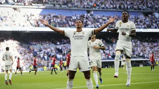 Jude Bellingham mencetak gol pada laga Real Madrid vs Osasuna di La Liga musim 2023/2024 (c) AP Photo/Jose Breton