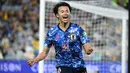 Selebrasi gelandang Jepang, Kaoru Mitoma setelah mencetak gol ke gawang Australia pada laga kualifikasi Piala Dunia 2022 Zona Asia Grup B di Australia Stadium (24/3/2022). Kaoru Mitoma menjadi pemain Jepang ke-12 yang pernah berlaga di Liga Inggris. Ia mengikuti jejak para pendahulunya seperti Maya Yoshida, Shinji Okazaki, Shinji Kagawa hingga Takumi Minamino. (AFP/Saeed Khan)