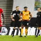Pemain Liverpool James Milner (kiri) dan rekan setimnya Sadio Mane bereaksi usai melawan Wolverhampton Wanderers pada pertandingan Liga Inggris di Stadion Molineux, Wolverhampton, Inggris, Senin (15/3/2021). Liverpool menang 1-0. (AP Photo/Jason Cairnduff,Pool)