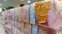 Penampakan uang palsu yang dibuat komplotan (Liputan6.com/Ady Anugrahadi)