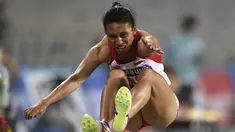 Maria Natalia Londa melakukan lompatan pada nomor lompat jauh putri Asian Games ke-17 di Incheon Asiad Main Staidium, (29/9). (AFP PHOTO/Martin Bureau)