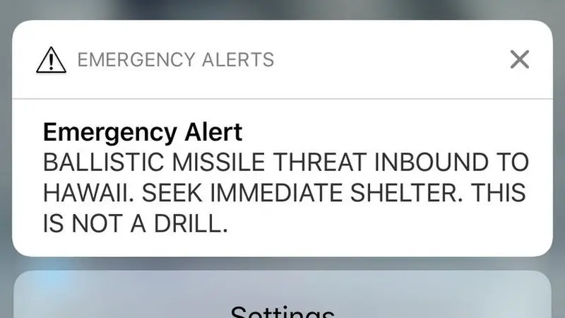 Notifikasi ancaman misil di Hawaii (13/1/2018) yang ternyata sebuah 'false alarm' alias imbauan palsu (supplied via The New York Times)