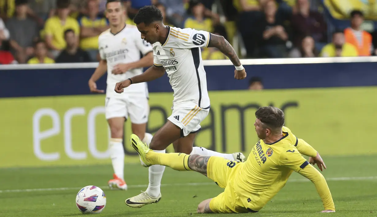 Berkat hasil ini, Real Madrid yang sudah dipastikan menjadi juara musim ini kini mengoleksi poin 94. (AP Photo/Alberto Saiz)