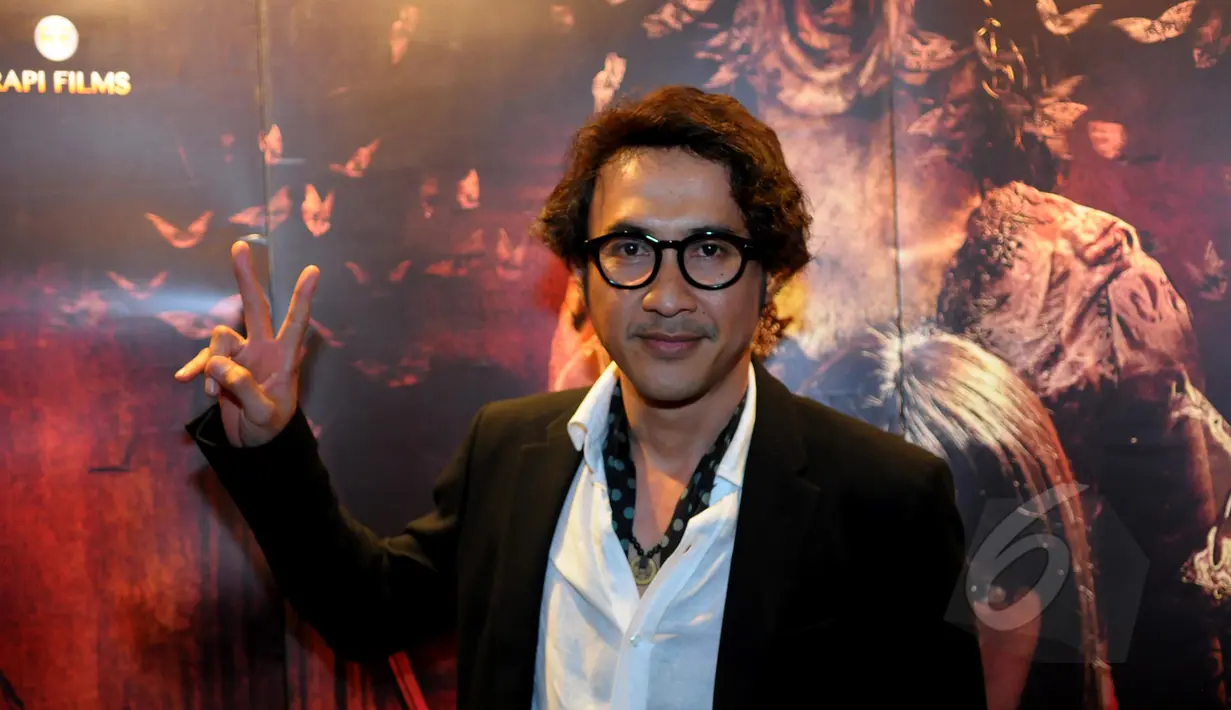 Aktor Agus Kuncoro saat menghadiri gala premiere WEWE di Epicentrum XXI, Jakarta, Senin (13/4/2015). (Liputan6.com/Faisal R Syam)