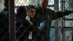 Pelaku penembakan massal di Florida, Nikolas Cruz dikawal petugas saat ditahan, Florida (15/2). Nikolas Cruz melakukan penembakan massal yang menewaskan 17 orang di SMA Majory Stoneman Douglas Florida. (Miguel Guttierez/AFP TV/AFP)