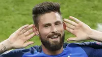 Olivier Giroud melakukan selebrasi usai mencetak gol ke gawang Rumania, pada Sabtu (11/6/2016). REUTERS/Charles Platiau