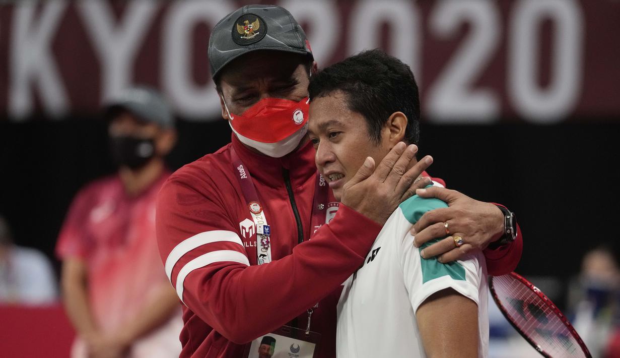 Fredy meraih medali setelah mengalahkan wakil dari India, Tarun melalui pertarungan dua gim dengan skor kemenangan yaitu 21-17 dan 21-11. (Foto: AP/Kiichiro Sato)