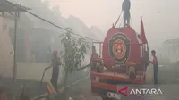 Permukiman Dekat Bandara Syamsudin Noor Dikepung Asap Kebakaran Hutan