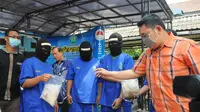  Keempat tersangka itu ditangkap saat sedang transaksi di Wilayah Aceh Timur (Liputan6.com/Herman Zakharia). 
