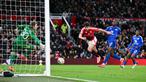 Pemain Manchester United, Harry Maguire, mencetak gol penentu kemenangan ke gawang Leicester City pada laga putaran keempat Piala FA di Stadion Old Trafford, Sabtu, (8/2/2025). (AFP/Oli Scarff)