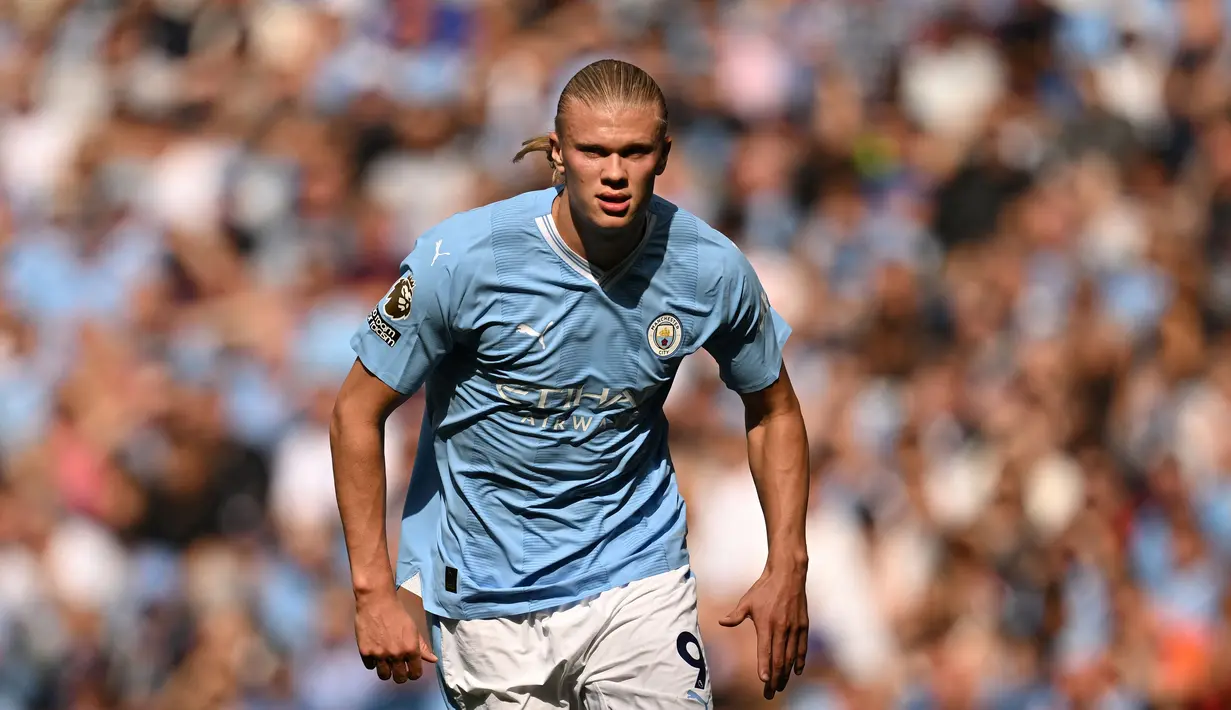 <p>Ekspresi pemain Manchester City, Erling Haaland, saat melawan Fulham dalam pertandingan pekan keempat Liga Inggris 2023/2024 yang berlangsung di Etihad Stadium, Sabtu (2/9/2023). Tiga gol yang dicetak ke gawang Fulham membuat dirinya kokoh di puncak daftar pencetak gol terbanyak sementara musim ini dengan enam gol. (AFP/Oli Scarff)</p>