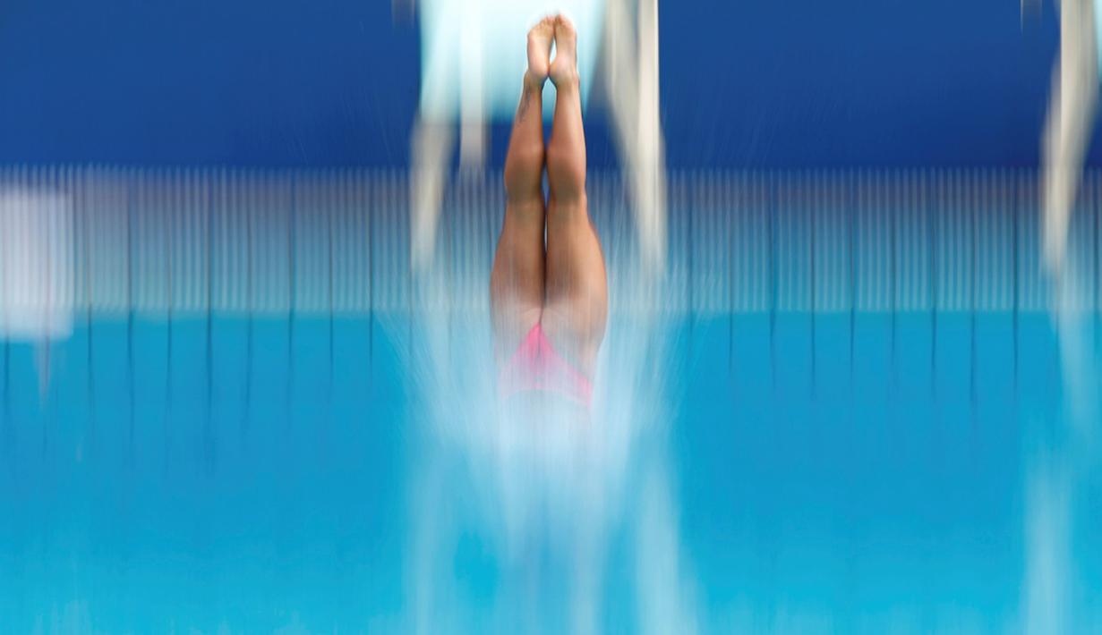  Peloncat indah Italia beraksi dalam sesi latihan di Maria Lenk Aquatics Centre - Rio De Janeiro, Brazil - 30/07/2016. (Reuters/Michael Dalder)
