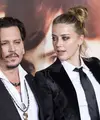 Perceraian Johnny Depp dan Amber Heard memang sudah selesai satu setengah tahun yang lalu. (VALERIE MACON / AFP)