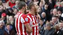 Penyerang Stoke, Marko Arnautovic, merayakan gol yang dicetaknya ke gawang Manchester United. Stoke berhasil menang 2-0 atas MU. (Reuters/Carl Recine)