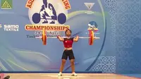 Lifter putri Indonesia, Sri Wahyuni Agustiani, menembus enam besar pada Kejuaraan Angkat Besi Asia di Tashkent, Uzbekistan, Minggu (24/4/2016). (Bola.com/Satlak Prima)